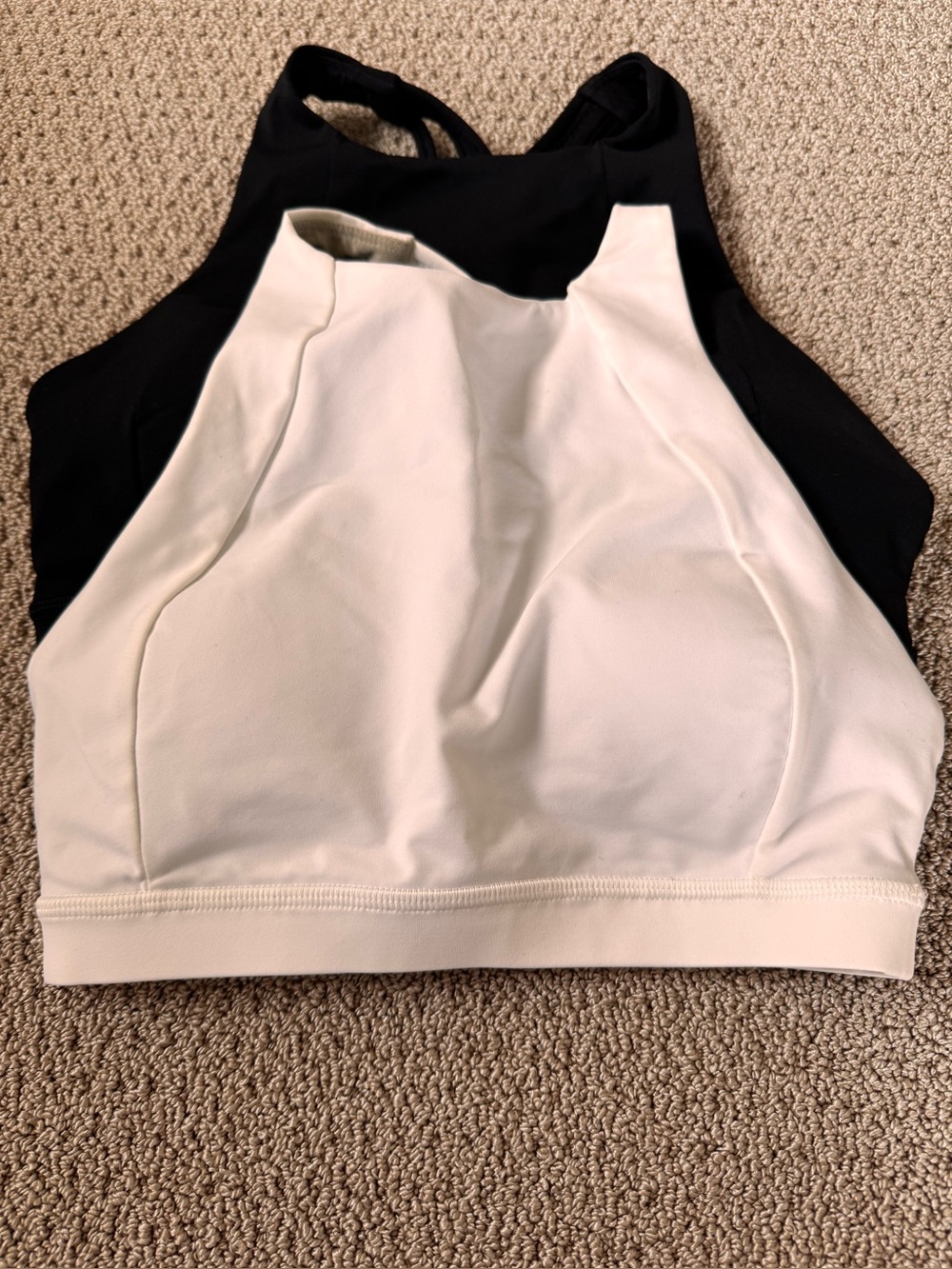Two Lululemon Sports Bras with removable cups. Excellent condition sz 2